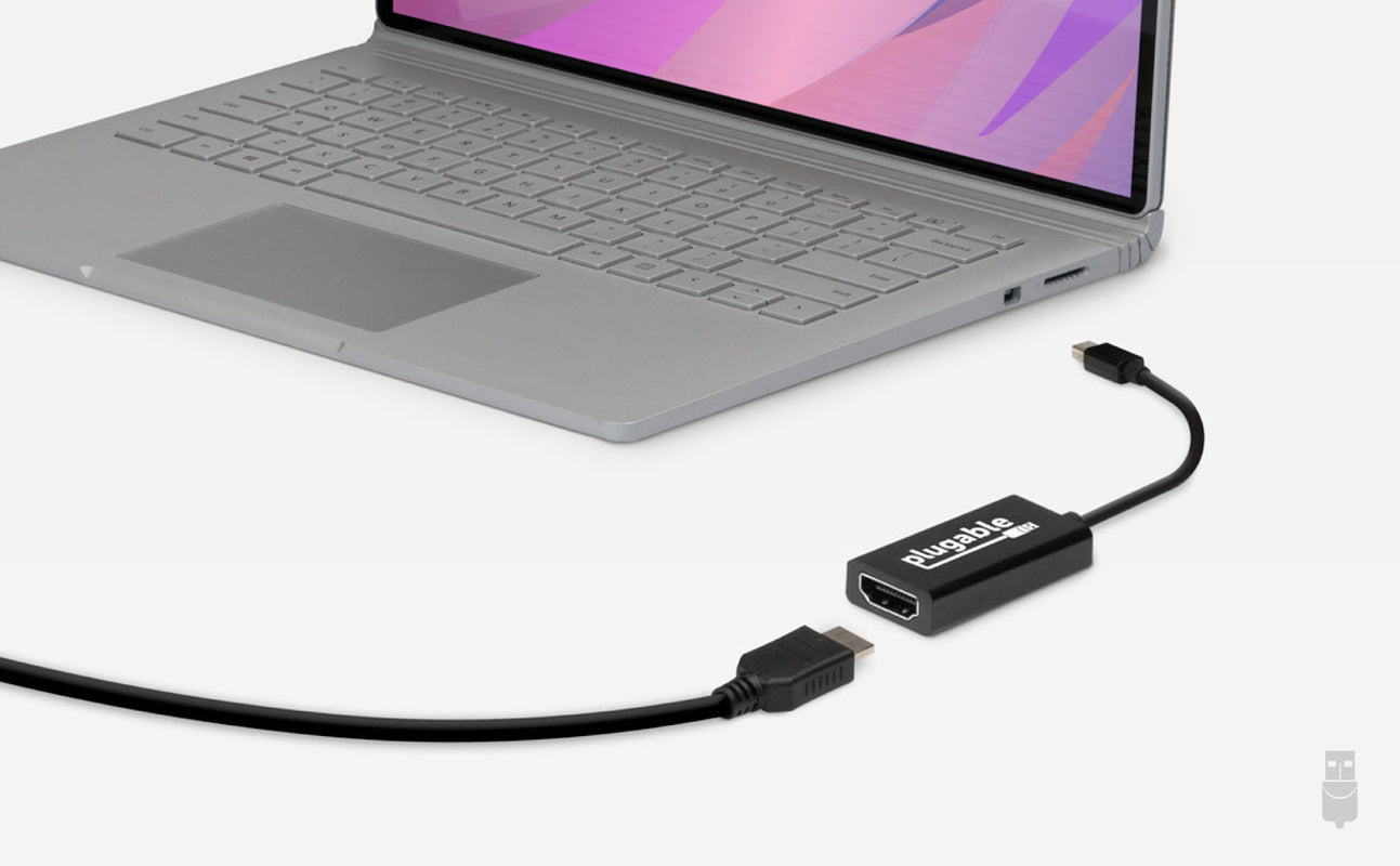 Mini DisplayPort to HDMI adatper between computer and HDMI cable
